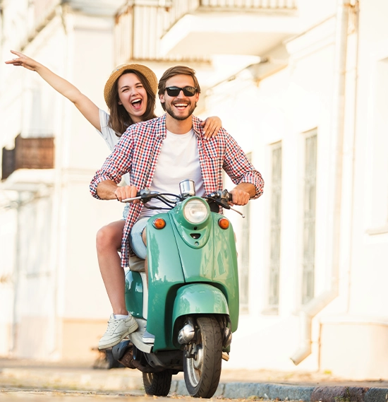Couple riding a motorbike