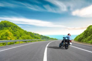 Motorcyclist riding on a mountain road towards Phillip Island Motorcycle Grand Prix